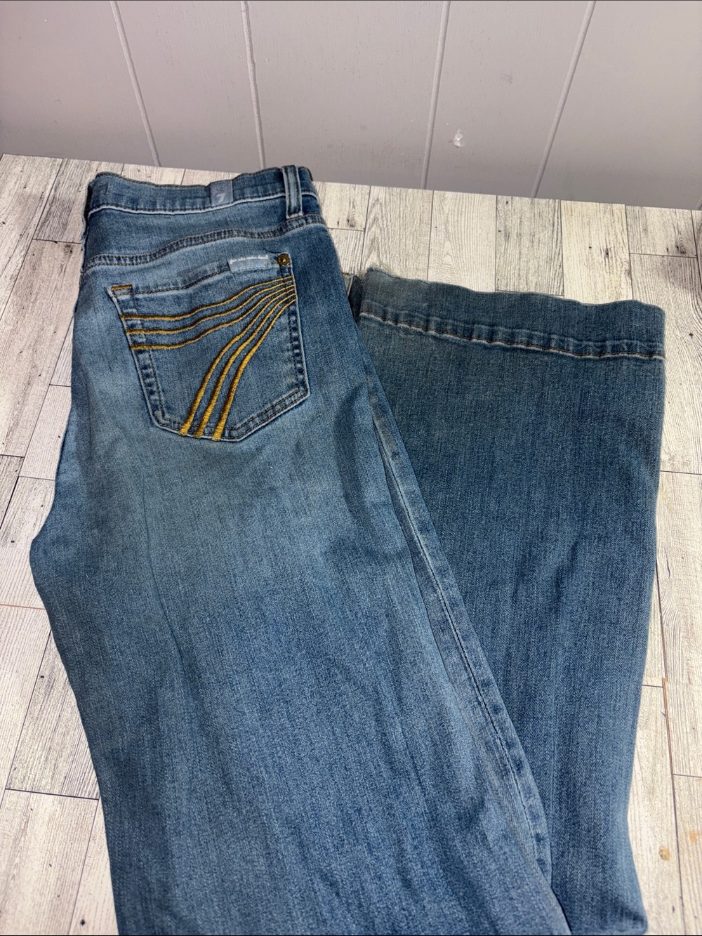 7 for all man kind dojo light wash gold pocket
